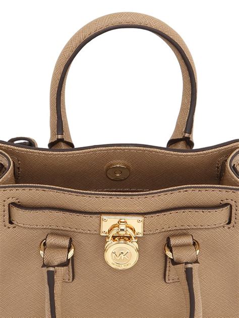 does michael kors have a warranty|michael kors handbags warranty information.